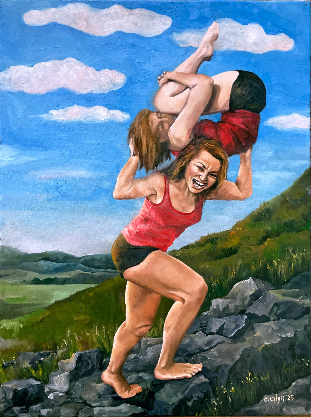 Two women on a rocky hill, one carrying the other overhead, embody strength and joy—"We Must Imagine Sisyphus Happy"
